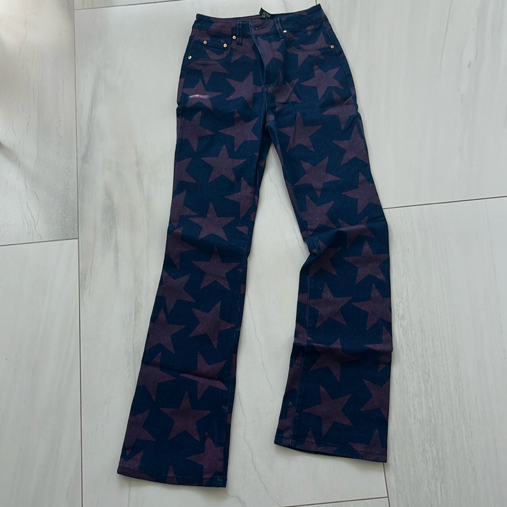 AFRM size 24 jeans with glitter purple stars…worn once